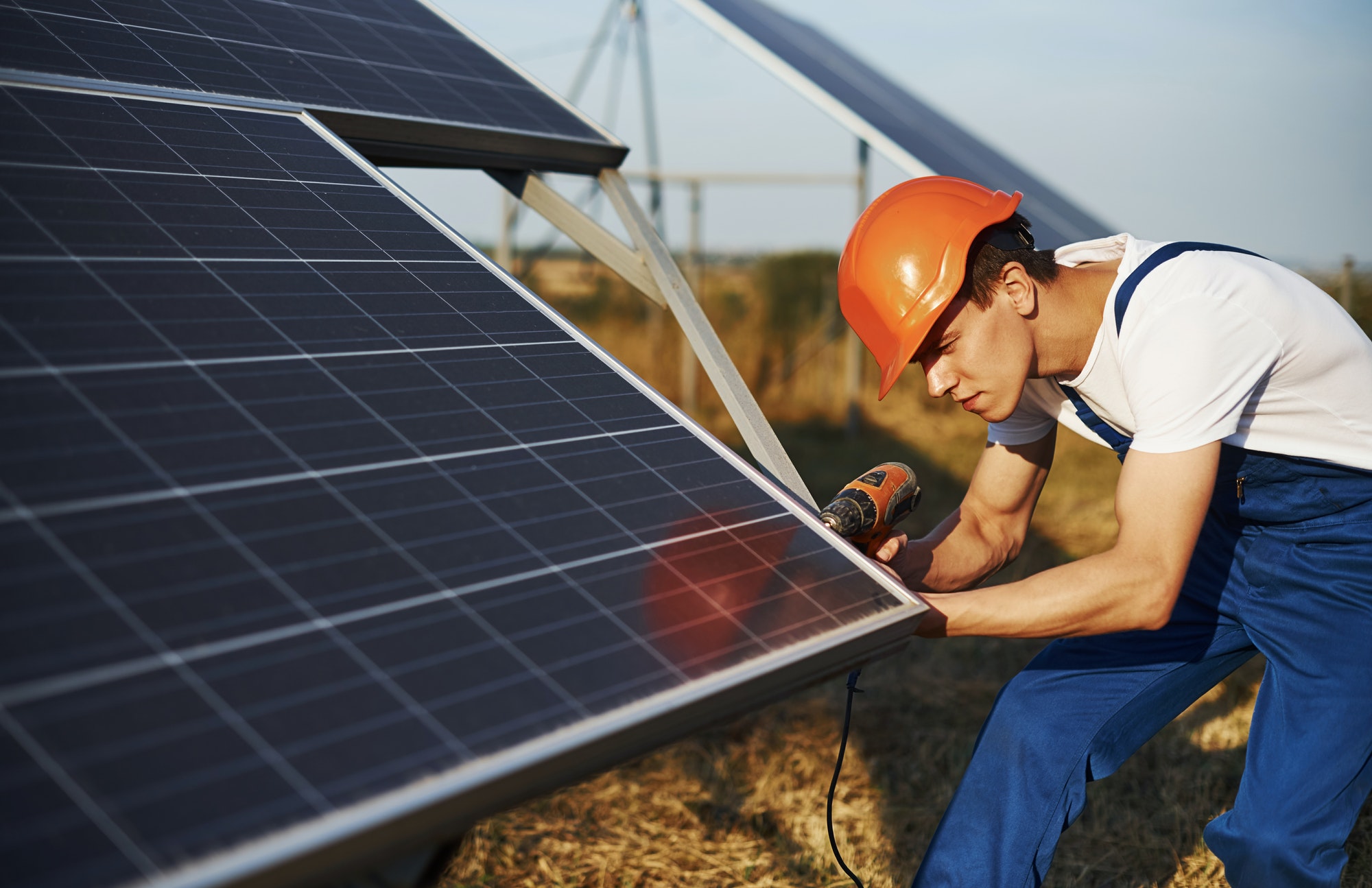 Technician working on solar batteries
